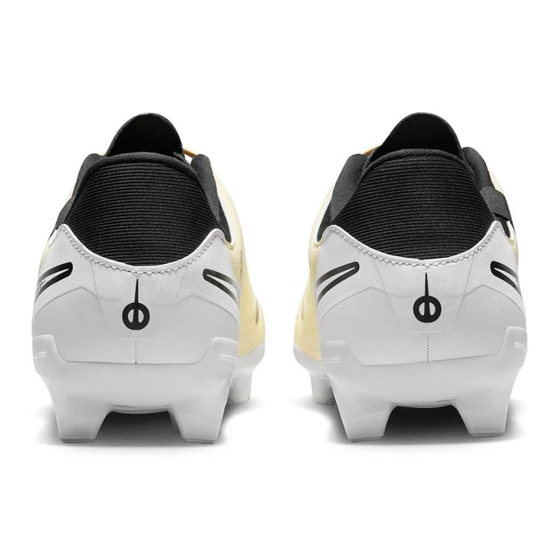 Yellow and black nike boots 2025