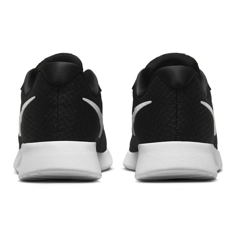 Nike women's tanjun running shoes black store