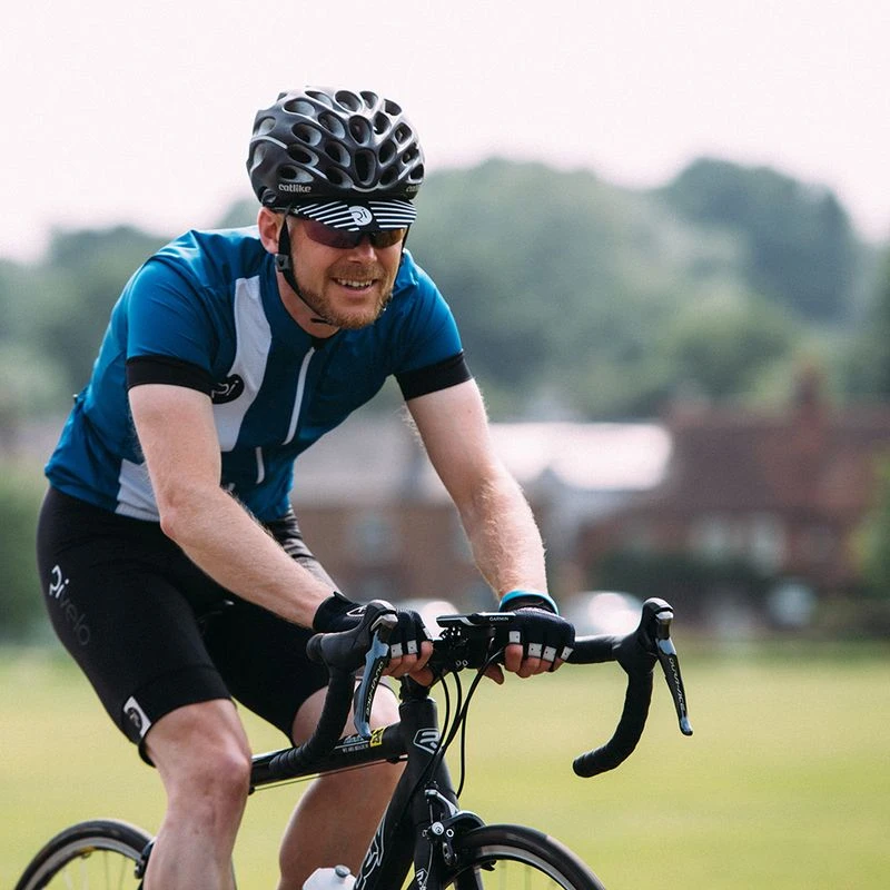 Road cycling cap outlet